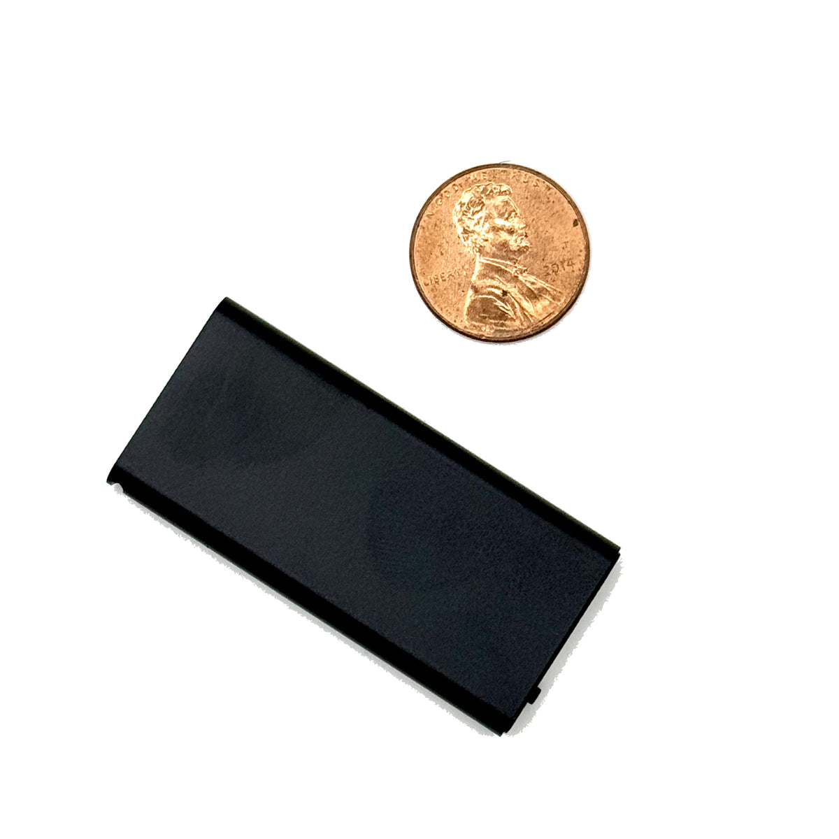 Micro voice recorder next to a penny for size